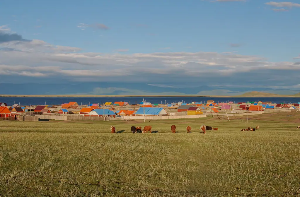 Colourful roofs of Tsagaan Nuur village by the lake