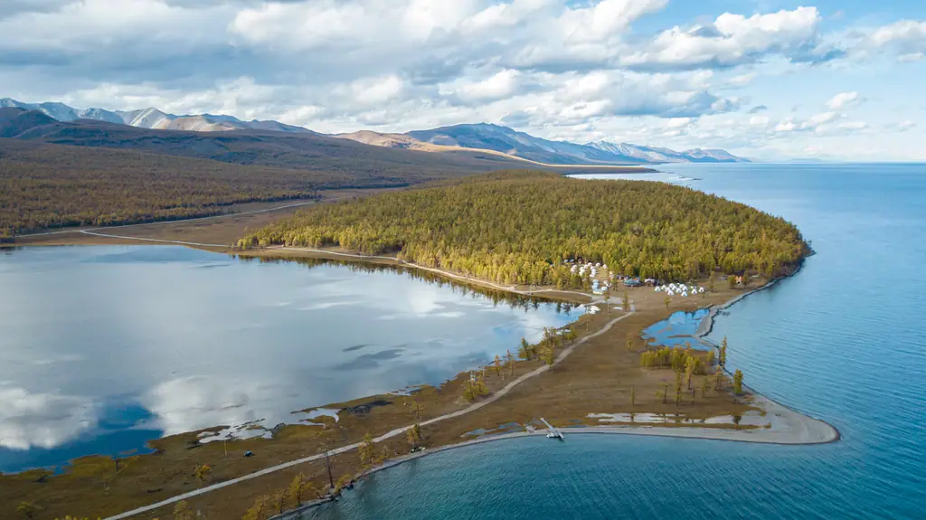 Lake Khövsgöl from the air, forest running to the shore